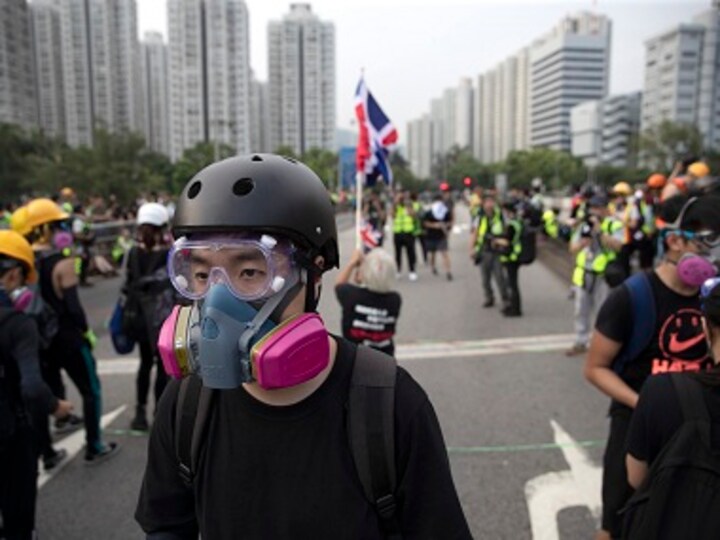 Hong Kong chief executive Carrie Lam announces ban on protesters wearing face masks, invokes emergency powers in bid to end unrest
