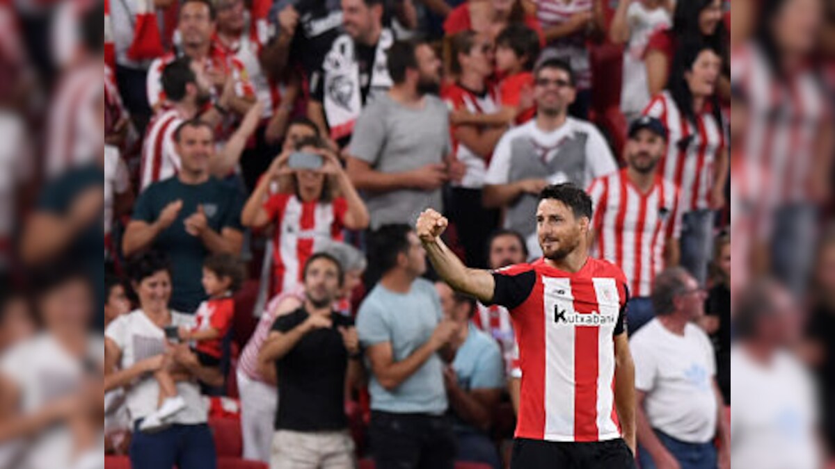 LaLiga: Aritz Aduriz scores sensational goal as Lionel Messi-less Barcelona begin title defence with loss to Athletic Bilbao