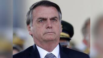 Brazil's Jair Bolsonaro says he will stop using French Bic pens after spat with Emmanuel Macron over Amazon fires