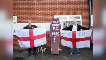 Bury FC expelled from English Football League after 125 years as takeover bid collapses; Bolton Wanderers in remission