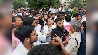 Heavy police deployment outside AIIMS, Safdarjung hospitals in Delhi on third day of doctors' protest against NMC bill