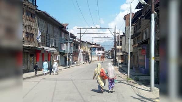 Communication blackout, troops build up leave Kashmiris anxious, fearful and restless