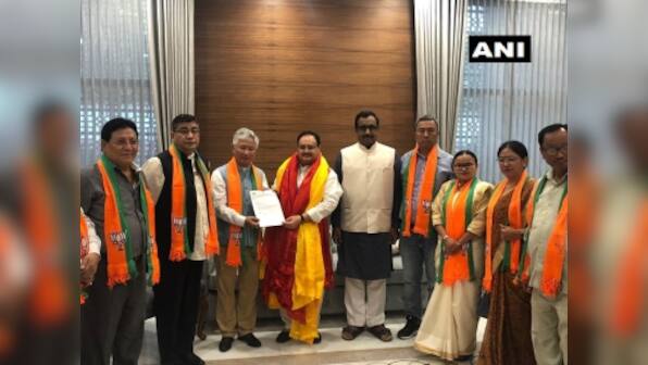 Ten MLAs of Sikkim Democratic Front join BJP today at Delhi's party headquarters, in presence of Ram Madhav, JP Nadda