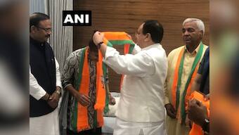 Wrestlers Babita Phogat and Mahavir Singh Phogat join BJP, say they were 'impressed with policies of Narendra Modi govt'