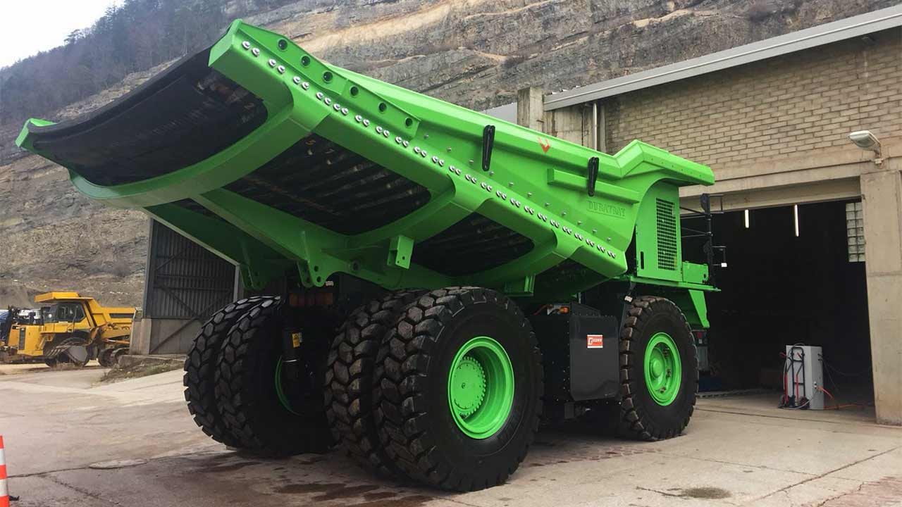 gigantic dump truck and fire truck