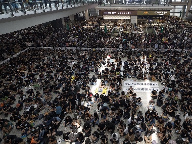 Hong Kong airport resumes operations after mass protests against riot police; hundreds of disrupted flights rescheduled Hong Kong airport resumes operations after mass protests against riot police; hundreds of disrupted flights rescheduled