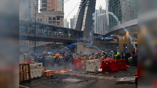 Hong Kong police fire tear gas, use water canons to disperse protestors; metro stations near protest site shut on second consecutive day