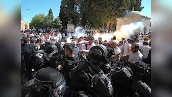 14 wounded in clashes between Muslim worshippers and Israeli Police at disputed holy site in Jerusalem