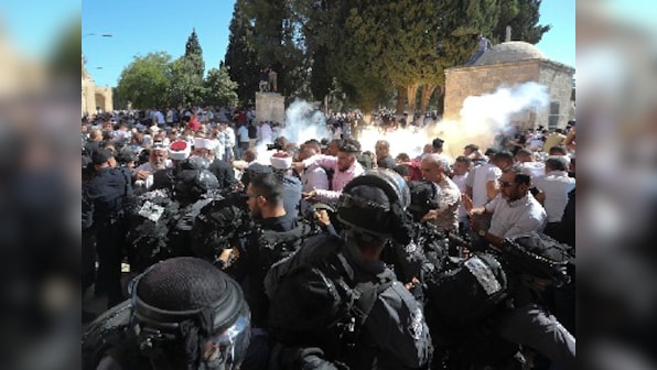 14 wounded in clashes between Muslim worshippers and Israeli Police at disputed holy site in Jerusalem