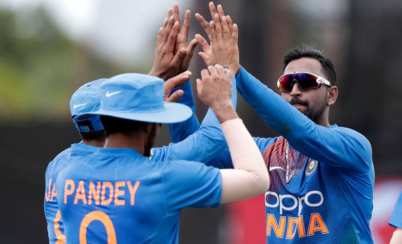 Krunal Panda (R) celebrates the wicket of Nicolas Pooran in the 2nd T20I. AP