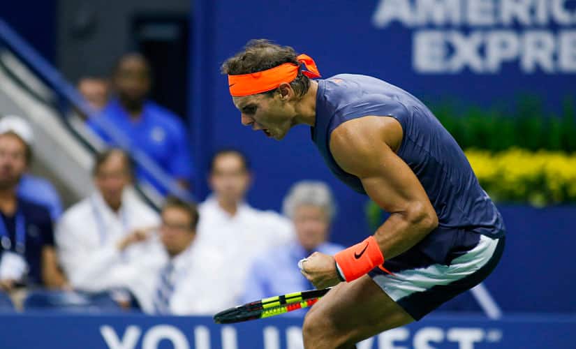 Spain’s Rafael Nadal celebrates after winning the second set against Austria’s Dominic Thiem during their Men’s Singles Quarter-Finals match at the 2018 US Open at the USTA Billie Jean King National Tennis Center in New York on September 4, 2018. (Photo by EDUARDO MUNOZ ALVAREZ / AFP)