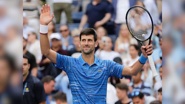 US Open 2019: Defending champion Novak Djokovic eases into second round with straight sets win over Roberto Carballes Baena