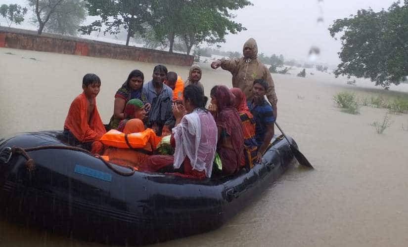 Rescue work being carried out in a flooded area in odisha. Image courtesy: Twitter@SRC_Odisha