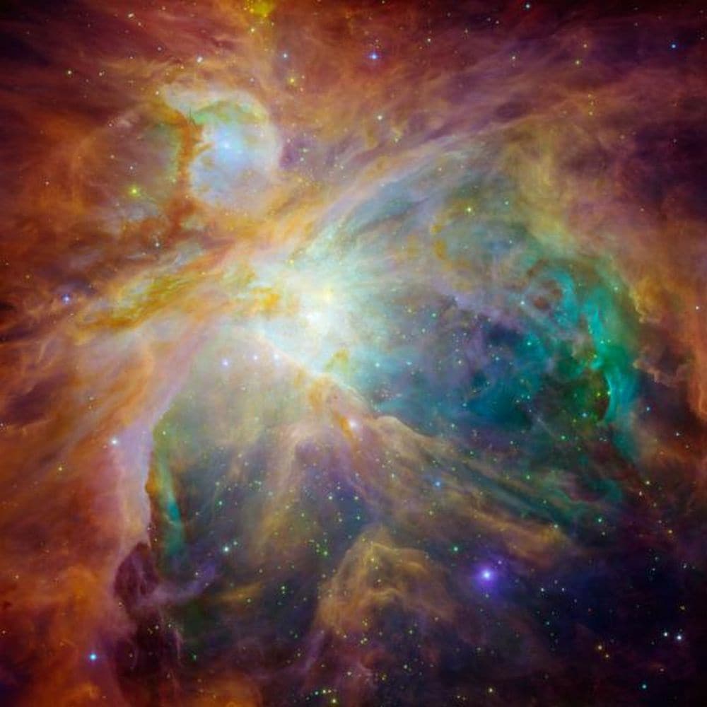 The Orion nebula, the brightest spot in the sword of the Orion constellation. This image is a combination of data from the Spritzer and Hubble telescopes. In the centre of the image are four massive stars that are collectively called the Trapezium. Image credit: NASA/JPL The Orion nebula, the brightest spot in the sword of the Orion constellation. This image is a combination of data from the Spritzer and Hubble telescopes. In the centre of the image are four massive stars that are collectively called the Trapezium. Image credit: NASA/JPL
