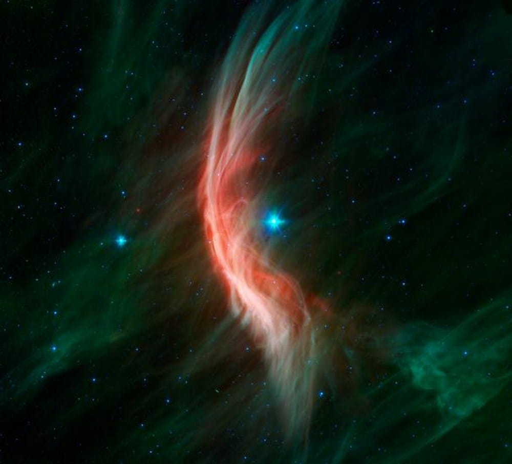 The Spitzer space telescope shows the giant star Zeta Ophiuchi and the bow shock or shock wave in front of it. The bow is only visible in infrared light and is created by winds that flow from the star making ripples in the surrounding dust. Image credit: NASA/JPL The Spitzer space telescope shows the giant star Zeta Ophiuchi and the bow shock or shock wave in front of it. The bow is only visible in infrared light and is created by winds that flow from the star making ripples in the surrounding dust. Image credit: NASA/JPL
