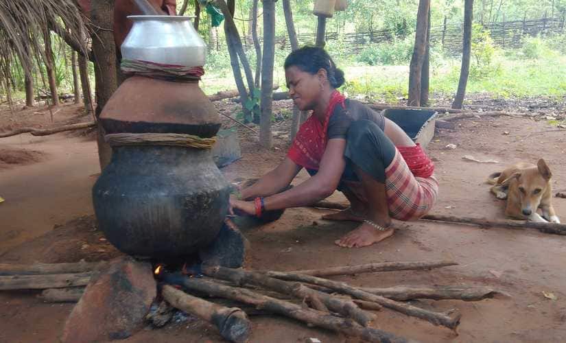 Sushila Pungati is preparing mahua for the family’s Bija Pandum ceremony. Image courtesy: Shone Satheesh