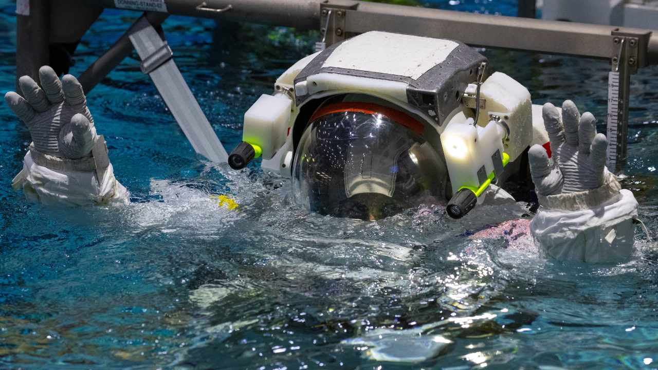 NASA Commercial Crew astronaut Sunita Williams is lowered into the water at NASA's Neutral Buoyancy Laboratory (NBL) training facility. Image: Reuters