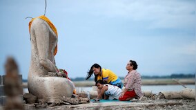Drought in Thailand exposes submerged Buddhist temple after dam water levels recedes