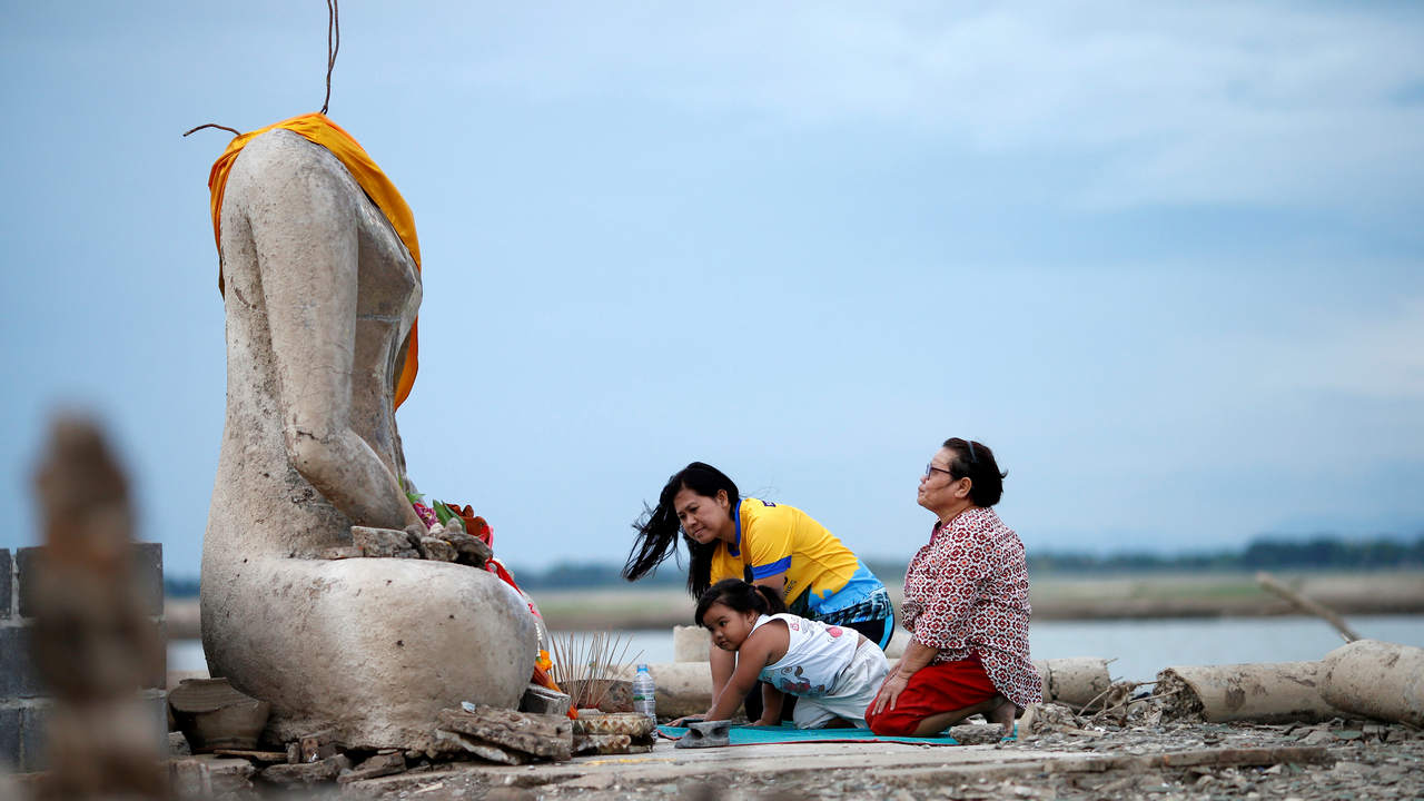Drought in Thailand exposes submerged Buddhist temple after dam water levels recedes Drought in Thailand exposes submerged Buddhist temple after dam water levels recedes