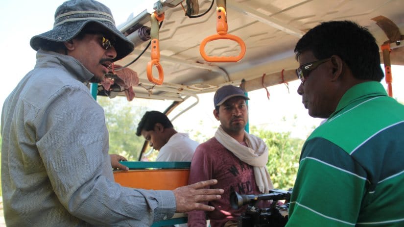 Supriyo Sen (L) during filming of Swimming Through The Darkness