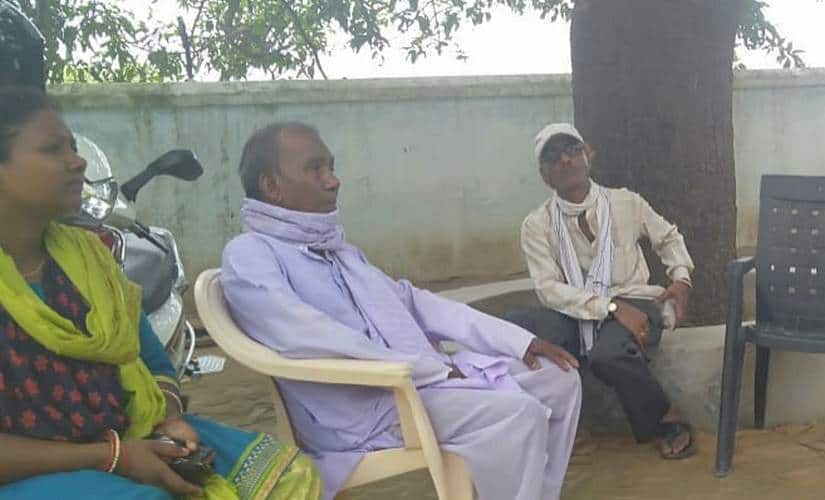 Maheshwar Tigga (centre) with Shanti, the first teacher from the tribe in Robertsganj. Image courtesy: Preeti Nangal