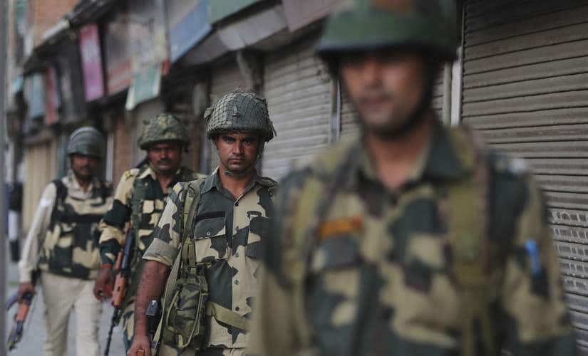 File image of Indian soldiers patrolling streets in Srinagar (4 August). AP