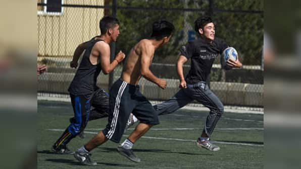 Away from better known sports in cricket and football, war-hardened kids in Afghanistan find a new sport: Rugby