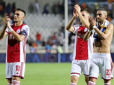 UEFA Champions League qualifying: Ajax secure spot in group stage draw with 2-0 win over APOEL; Club Brugge, Slavia Prague also through