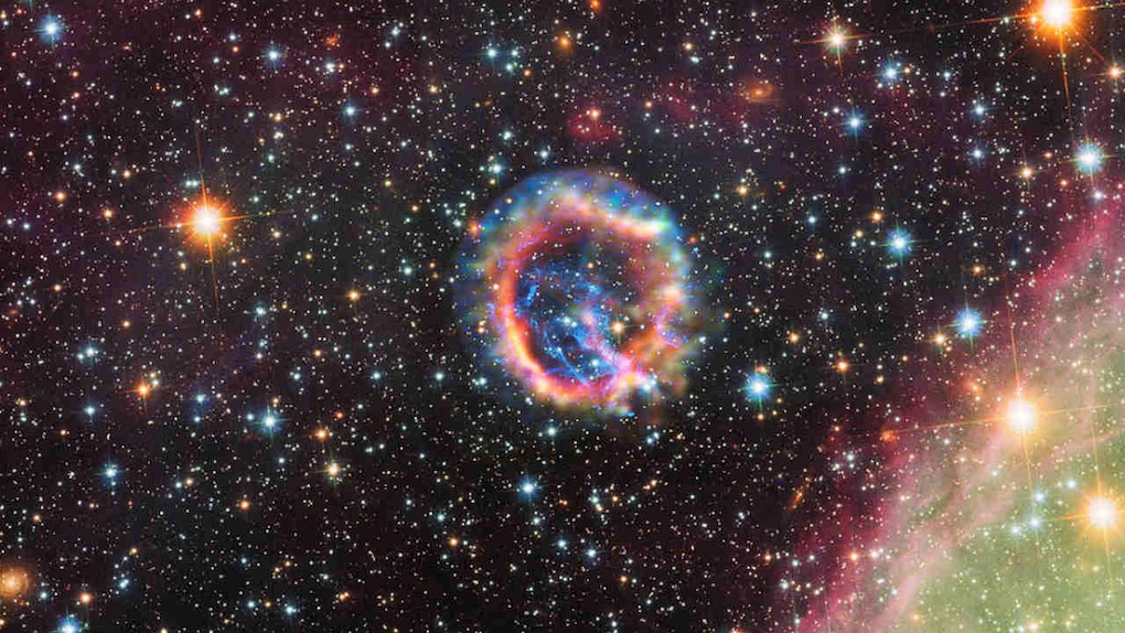 This is a supernova remnant that was produced by a massive star that exploded in a nearby galaxy, Small Magellanic Cloud. X-rays from Chandra helped astronomers confirm that most of the oxygen in the universe is synthesized in massive stars. Image credit: NASA/CXC