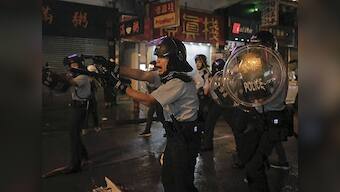 Hong Kong pro-democracy protests escalate as demonstrators attack police with sticks, rods; 36, including 12-year-old, arrested
