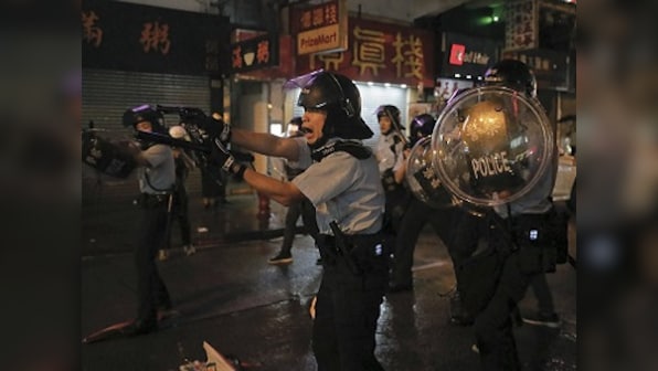 Hong Kong pro-democracy protests escalate as demonstrators attack police with sticks, rods; 36, including 12-year-old, arrested