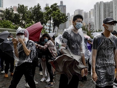 Hong Kong pro-democracy protests: Tensions continue as protesters appear in court on charges of rioting