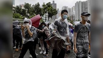 Hong Kong pro-democracy protests: Tensions continue as protesters appear in court on charges of rioting