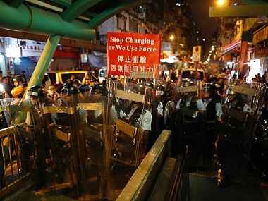 Hong Kong pro-democracy protesters apologise for 'reckless' violence at airport; China says demonstrations 'near terrorism' Hong Kong pro-democracy protesters apologise for 'reckless' violence at airport; China says demonstrations 'near terrorism'