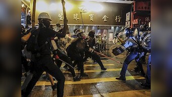 Hong Kong Police round up pro-democracy activists after civil rights group calls off Saturday's mass rally