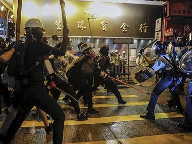 Hong Kong Police round up pro-democracy activists after civil rights group calls off Saturday's mass rally Hong Kong Police round up pro-democracy activists after civil rights group calls off Saturday's mass rally