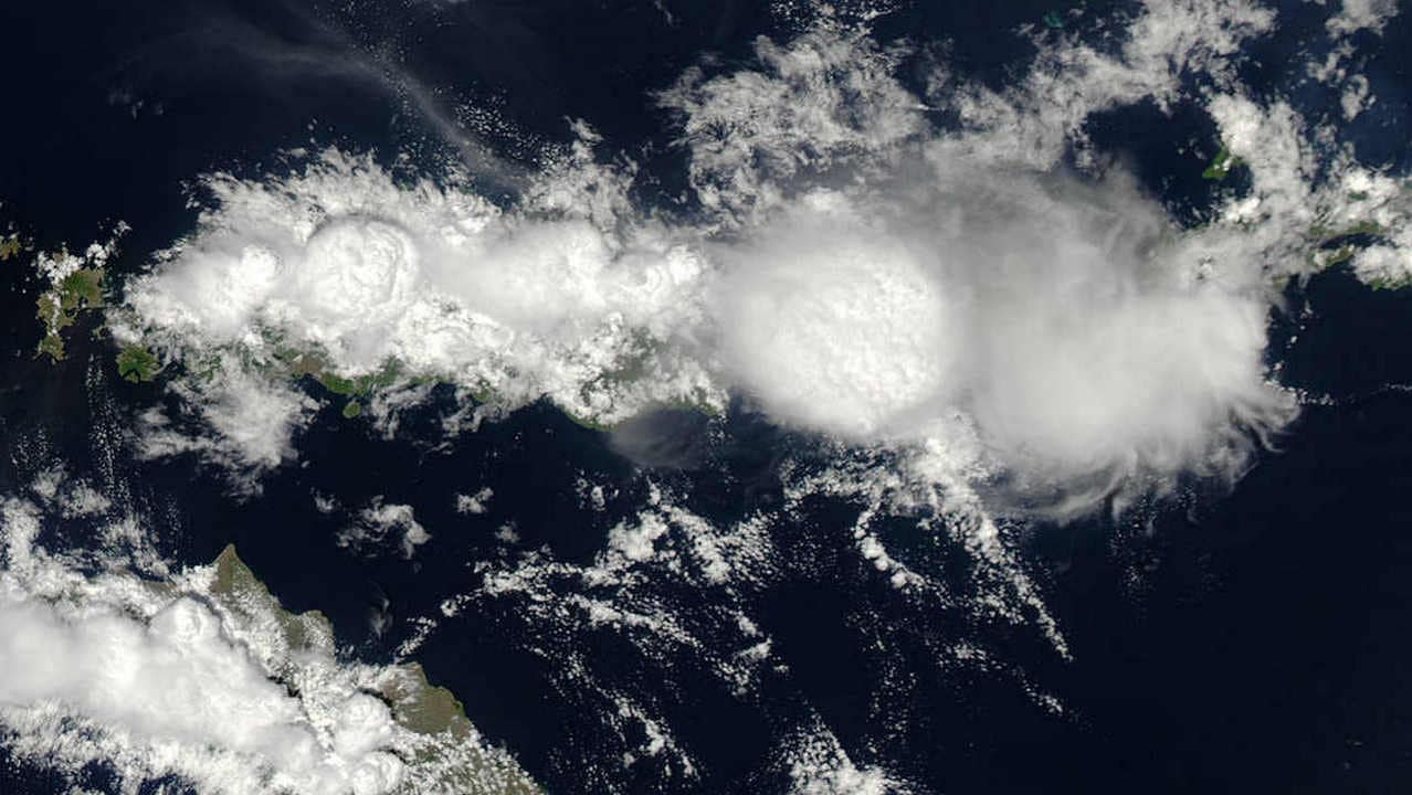 Cloud cover as viewed from space. Image Credit: NASA/Jeff Schmaltz, LANCE/EOSDIS MODIS Rapid Response Team, NASA GSFC