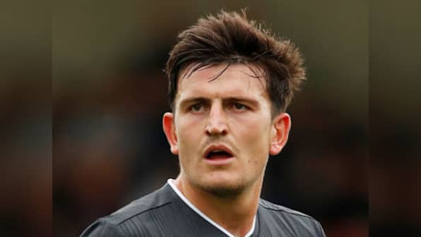 Premier League: Leicester City defender Harry Maguire signs for Manchester United on reported world-record fee of £80 million