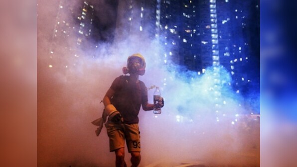 Hong Kong protests: Police arrest more than 20 people for 'unlawful assembly and assault' day after violent clashes