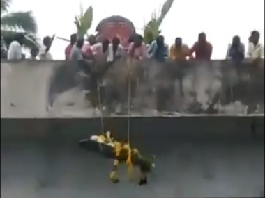 Video of Dalit man's body being lowered from bridge for cremation goes viral after upper caste Hindus deny access through land Video of Dalit man's body being lowered from bridge for cremation goes viral after upper caste Hindus deny access through land
