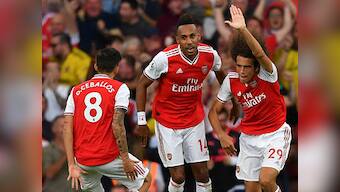 Premier League: Arsenal fight back from two goals down to salvage a point against Tottenham in North London derby