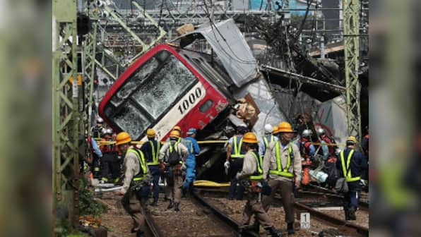 One killed, 30 injured in Japan after express train, truck collide on busy line connecting Tokyo and Yokohama