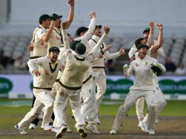 Australia players celebrate their win at the Old Trafford. AFP