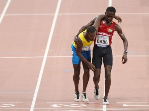 World Athletics Championships 2019: Braima Dabo's act of sportsmanship to help rival Jonathan Busby finish race wins day World Athletics Championships 2019: Braima Dabo's act of sportsmanship to help rival Jonathan Busby finish race wins day