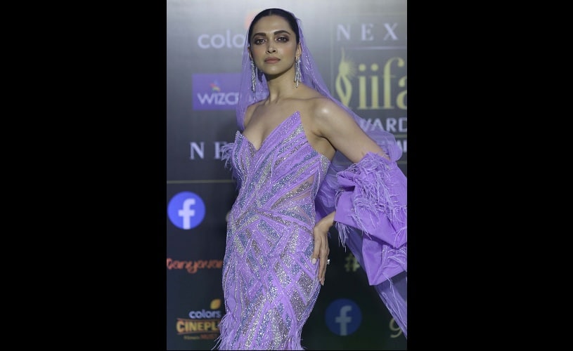 Deepika Padukone looked radiant in a custom purple gown and veil by Gaurav Gupta as she posed for the shutterbags | Sachin Gokhale
