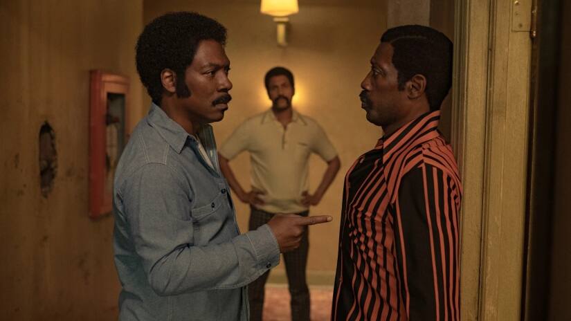 Rudy Ray Moore (Eddie Murphy) argues with D’Urville Martin (Wesley Snipes) with Jerry Jones (Keegan-Michael Key) in the background | Netflix