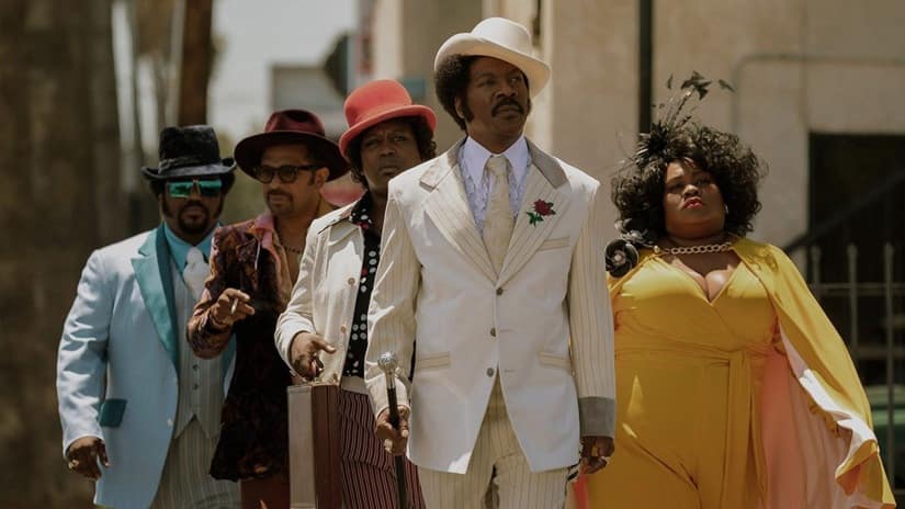 (From L-R) Craig Robinson as Ben Taylor, Mike Epps as Jimmy Lynch, Tituss Burgess as Theodore Toney, Eddie Murphy as Rudy Ray Moore, and Da’Vine Joy Randolph as Lady Reed | Netflix