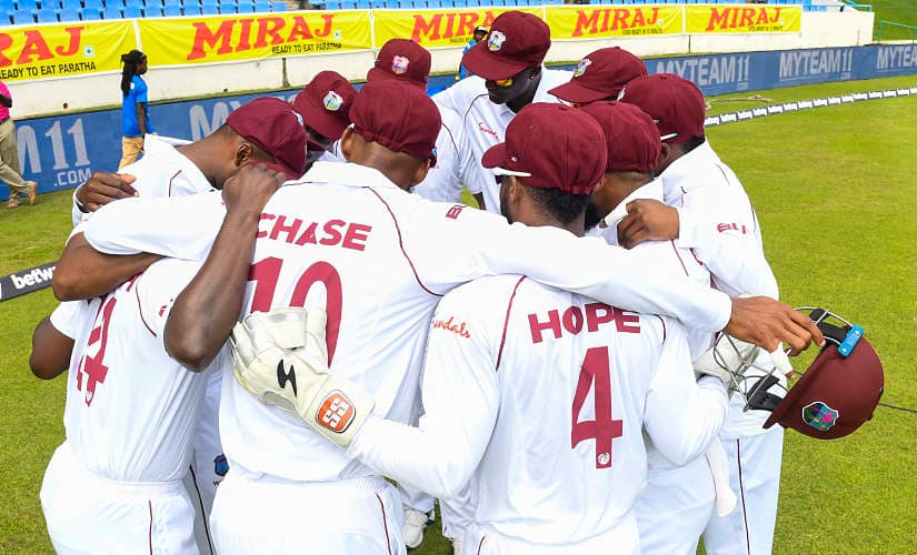 West Indies team huddle at the start of day 1 of the 1st Test between West Indies and India at Vivian Richards Cricket Stadium in North Sound, Antigua and Barbuda, on August 22, 2019. (Photo by Randy Brooks / AFP)