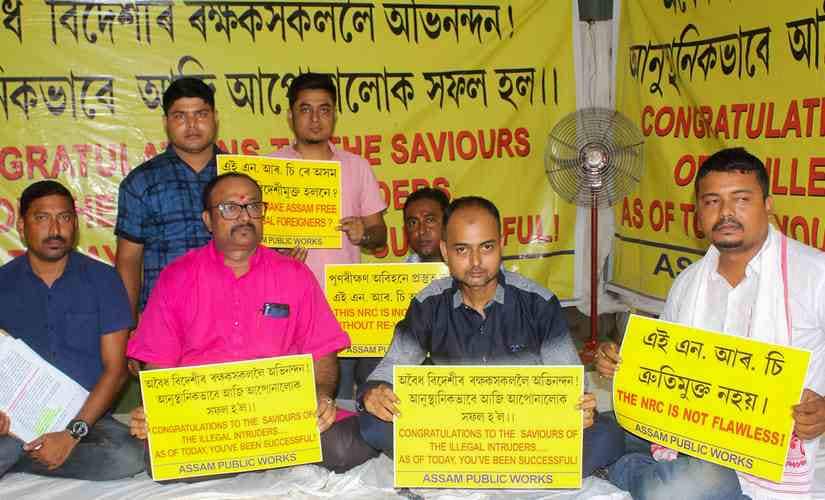 Members of Assam Public Works (APW) sit in protest after declaration of final draft of NRC. PTI