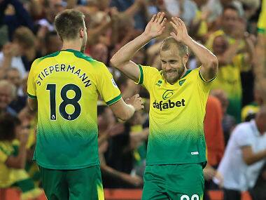 Premier League: In-form striker Teemu Pukki stars as Norwich City stun defending champions Manchester City in five-goal thriller